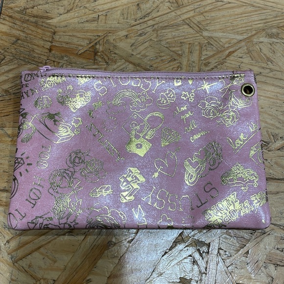 New without tags. Super cute pink small Stussy zipper bag with gold print. - Picture 1 of 5